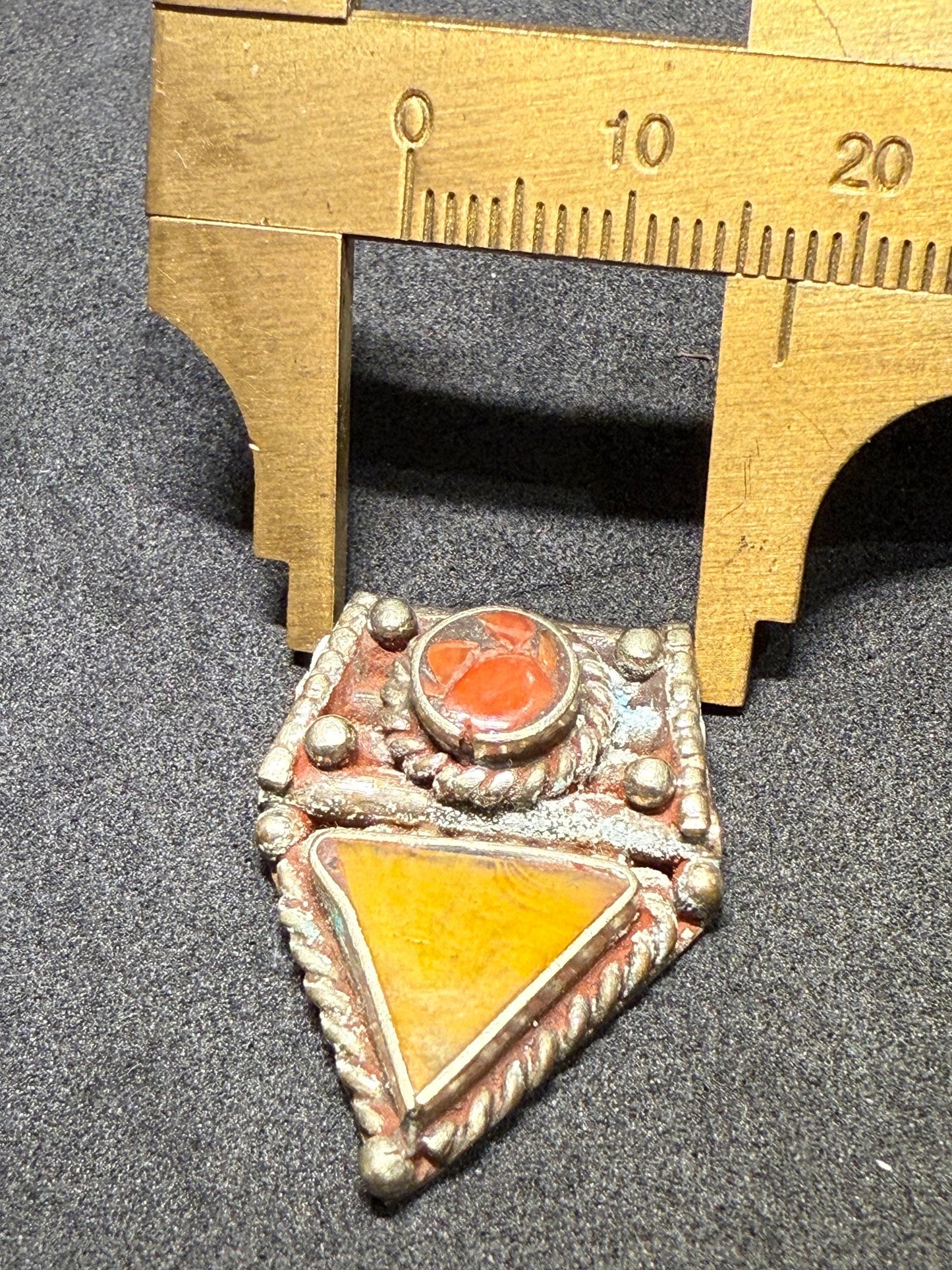 Ethnic Himalayan Pendant with Amber and Red Coral Accents | Artisan Jewelry Design