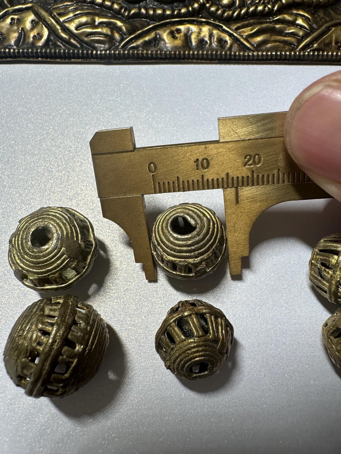 Handmade Brass Cage Beads: African Tribal Jewelry Design