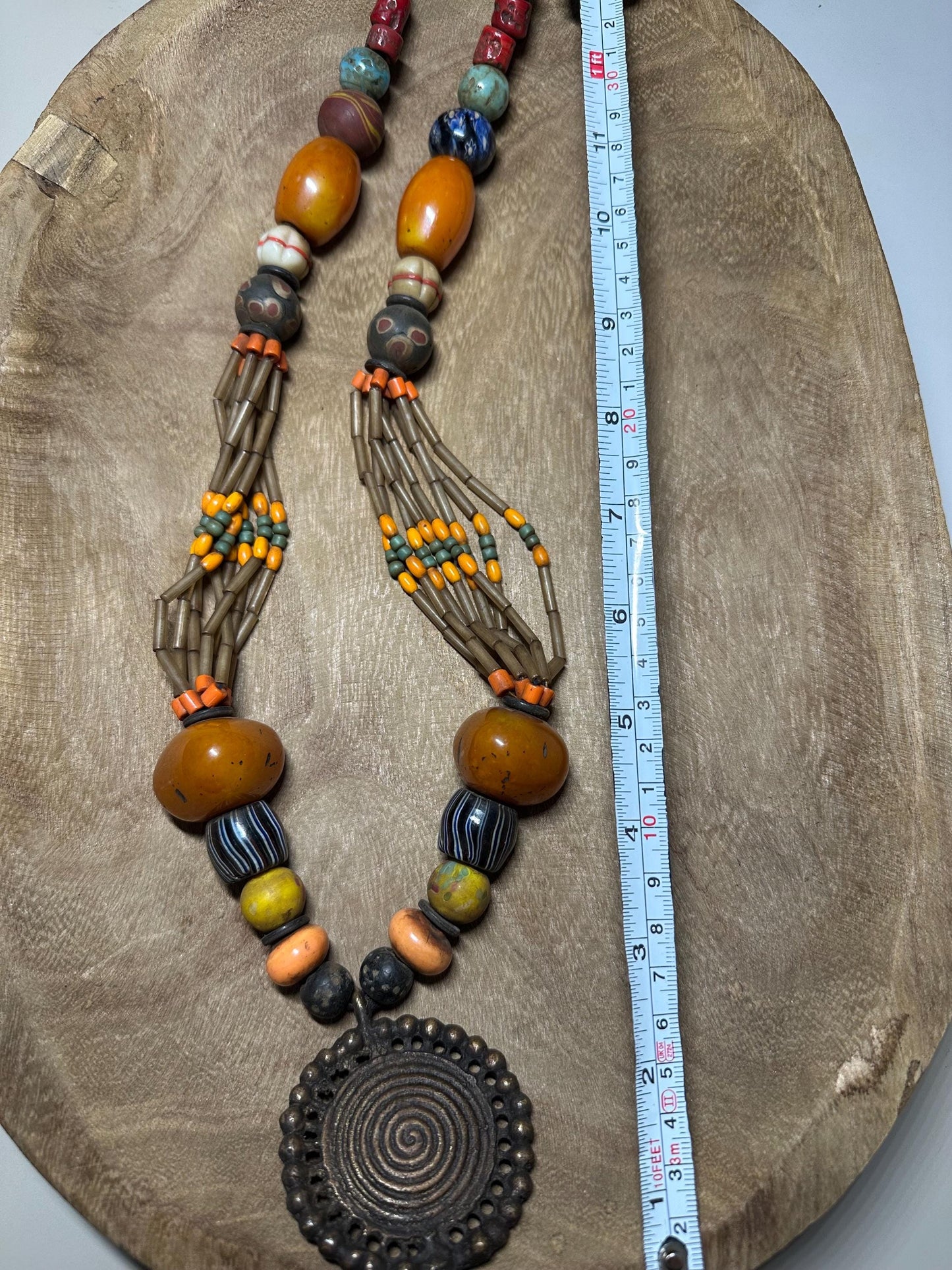 Tribal Necklace: Brass Spiral Pendant, Vintage Amber Beads, Nepalese Jewelry