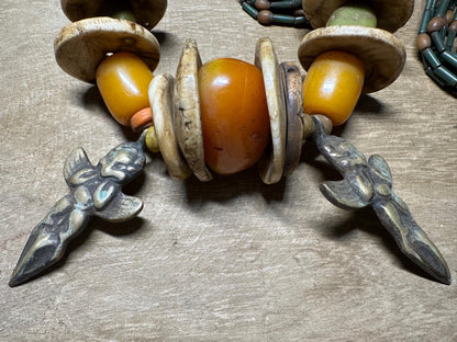 Handmade Nepal Tribal Necklace: Amber Resin, Bone & Brass Amulets