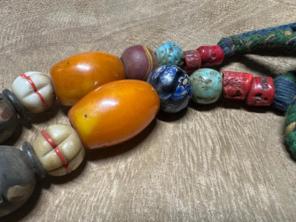 Tribal Necklace: Brass Spiral Pendant, Vintage Amber Beads, Nepalese Jewelry