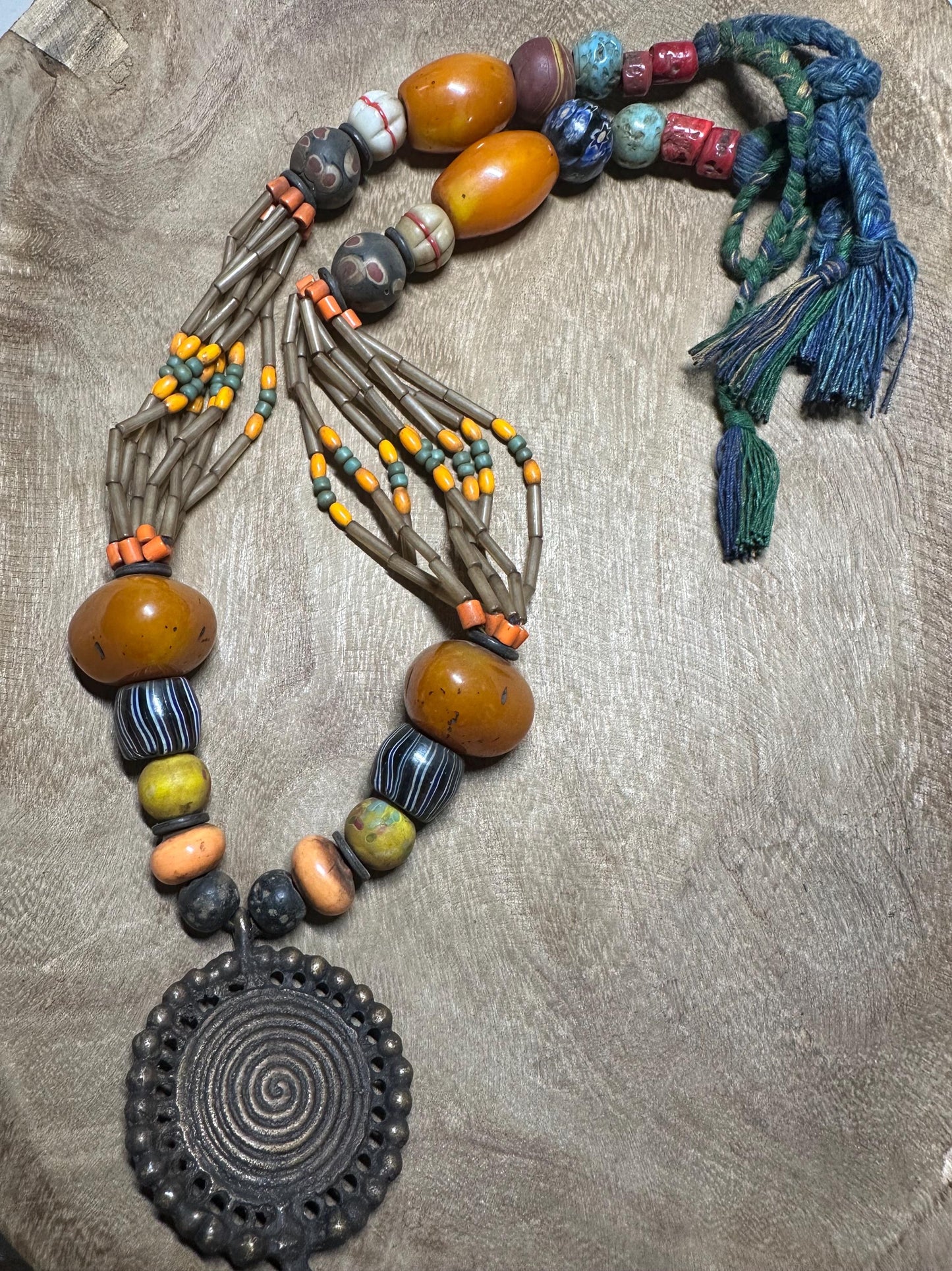 Tribal Necklace: Brass Spiral Pendant, Vintage Amber Beads, Nepalese Jewelry