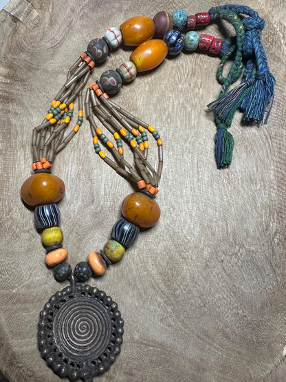 Tribal Necklace: Brass Spiral Pendant, Vintage Amber Beads, Nepalese Jewelry
