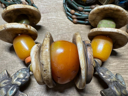 Handmade Nepal Tribal Necklace: Amber Resin, Bone & Brass Amulets