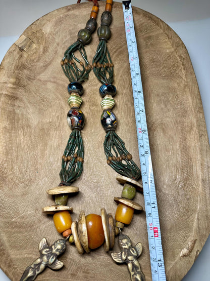 Handmade Nepal Tribal Necklace: Amber Resin, Bone & Brass Amulets