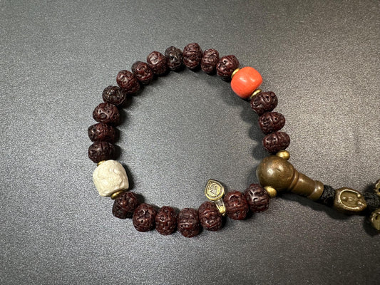 Tibetan Bodhi Seed Mala Bracelet with Copper Guru Bead and Tibetan Resin Accents  Handcrafted Wrist Mala for Meditation