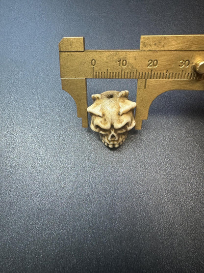 Hand-Carved Antler Citipati Skull Guru Bead with Grasping Hand  Tibetan Charnel Ground Amulet