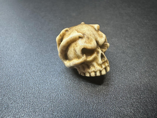 Hand-Carved Antler Citipati Skull Guru Bead with Grasping Hand  Tibetan Charnel Ground Amulet